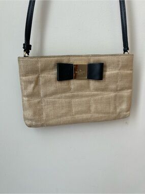 kate spade Metallic light Gold Crossbody with Black Bow Accent